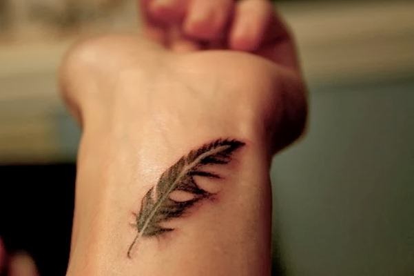 tatuagem pequena no braço